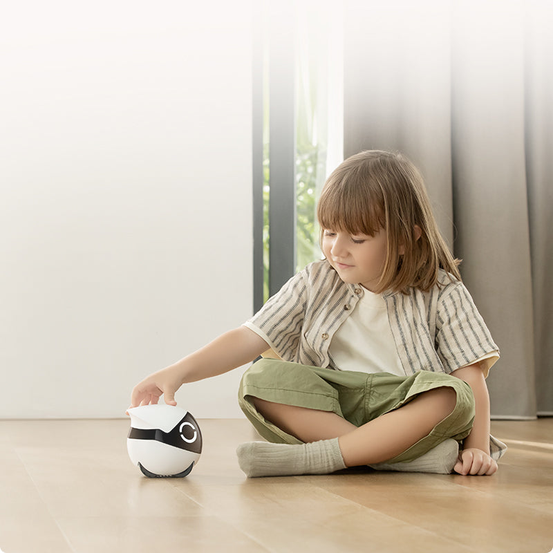 ROLA Mini smart camera with two-way audio, enabling real-time interaction with children and pets while monitoring home safety.